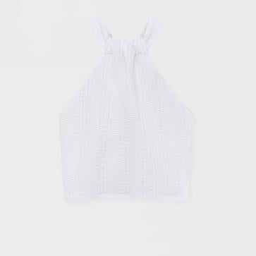 Imagen secundaria 1 - Los colores que mejor sientan cuando estás morena: blanco, azul y naranja