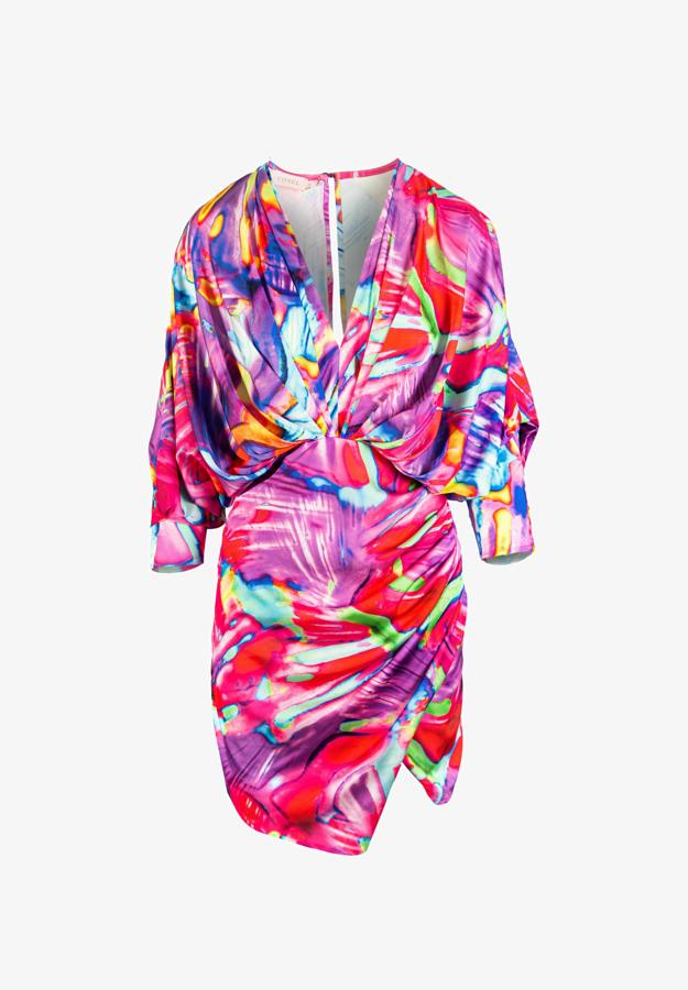 De cocktail y con un print psicodélico para las más atrevidas. Su escote de pico permite usar complementos sencillos para rematar el look. Es de Cosel. Precio: 179 €.