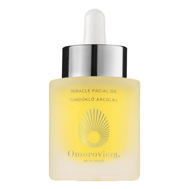 Miracle Facial Oil de Omorovicza es un aceite rejuvenecedor ultra ligero pero muy potente, con una mezcla única de vitaminas que estimula la producción de colágeno y elastina para perfeccionar el rostro. Está formulado con algas hidratantes y reafirmantes, aceite de espino amarillo, bakuchiol, rosa mosqueta y almendra dulce que tersan, reafirman, rellenan, igualan e iluminan drásticamente. Cómpralo aquí