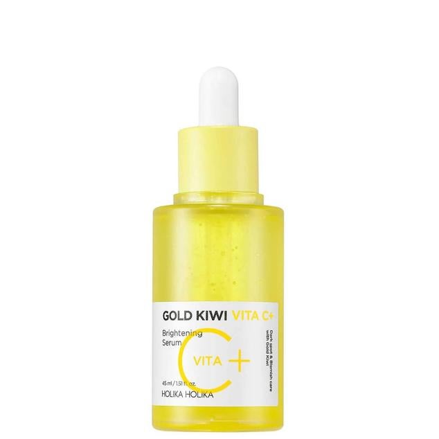 Gold Kiwi Vita C+ Brightening Serum de Holika Holika potencia la máxima luminosidad y revitaliza el cutis con su poderosa combinación de ingredientes antioxidantes, iluminadores, despigmentantes y aclaradores. Este sérum está formulado con vitamina C, niacinamida, cúrcuma, kiwi dorado, arbutina, biotina, pantenol, riboflavina, ácido hialurónico, vitamina E, ácido fólico, adenosina y otros extractos de plantas que trabajan para rejuvenecer la piel de forma drástica. Cómpralo aquí