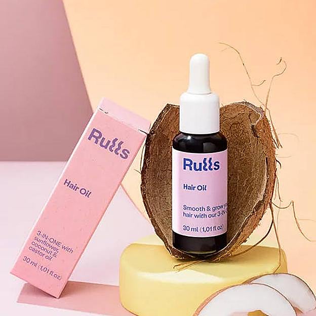 Imagen principal - Dos aceites y un sérum específicamente formulados para pelo rizado