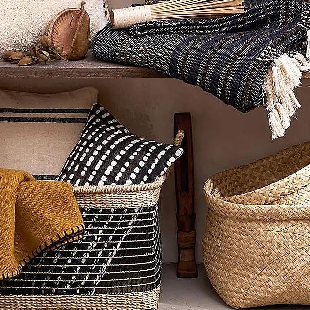 Una funda de cojín boho para un recibidor muy original.