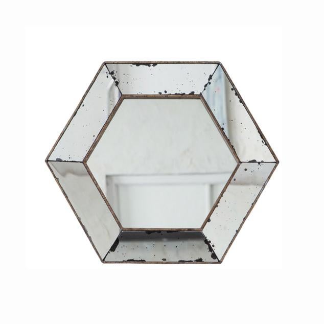 Espejo envejecido de formato hexagonal de Katira (102 €)