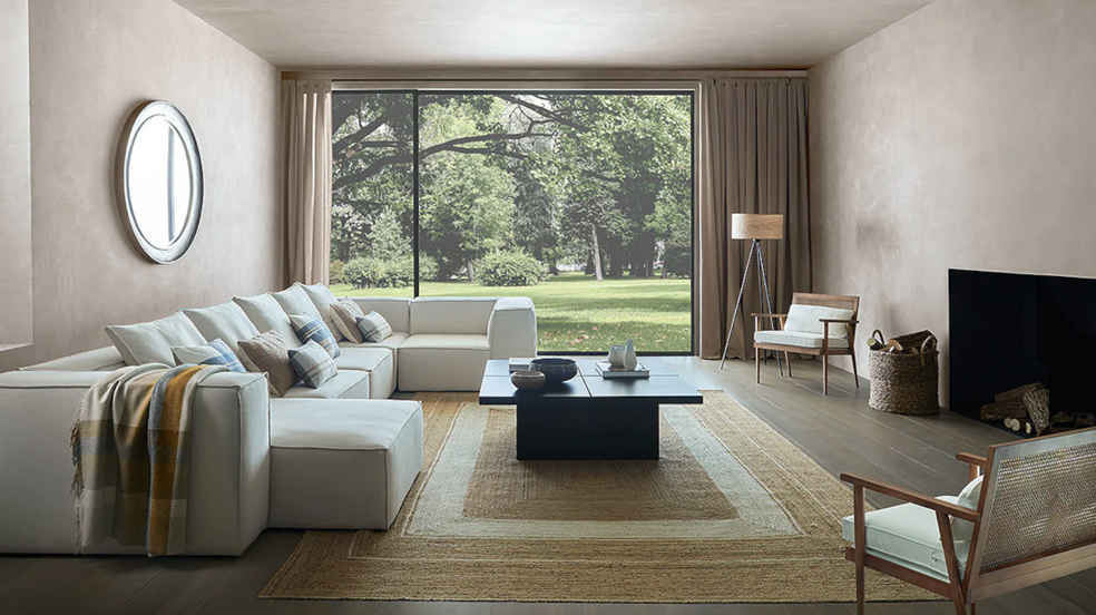 Los muebles y adornos más bonitos y baratos de El Corte Inglés para copiar la decoración de este salón acogedor, minimalista y funcional