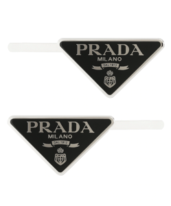 Imagen secundaria 2 - Horquillas de clip de Balenciaga (225€); Diadema con detalles de brillo de Gucci (370€) y Pasadores con logo de Prada (360€).