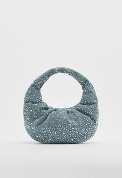 Imagen secundaria 2 - Bolso ovalado con brillos de Zara (39,95 euros).