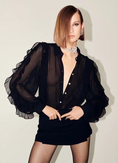 Imagen - Blusa de textura con volantes, 35,99€.