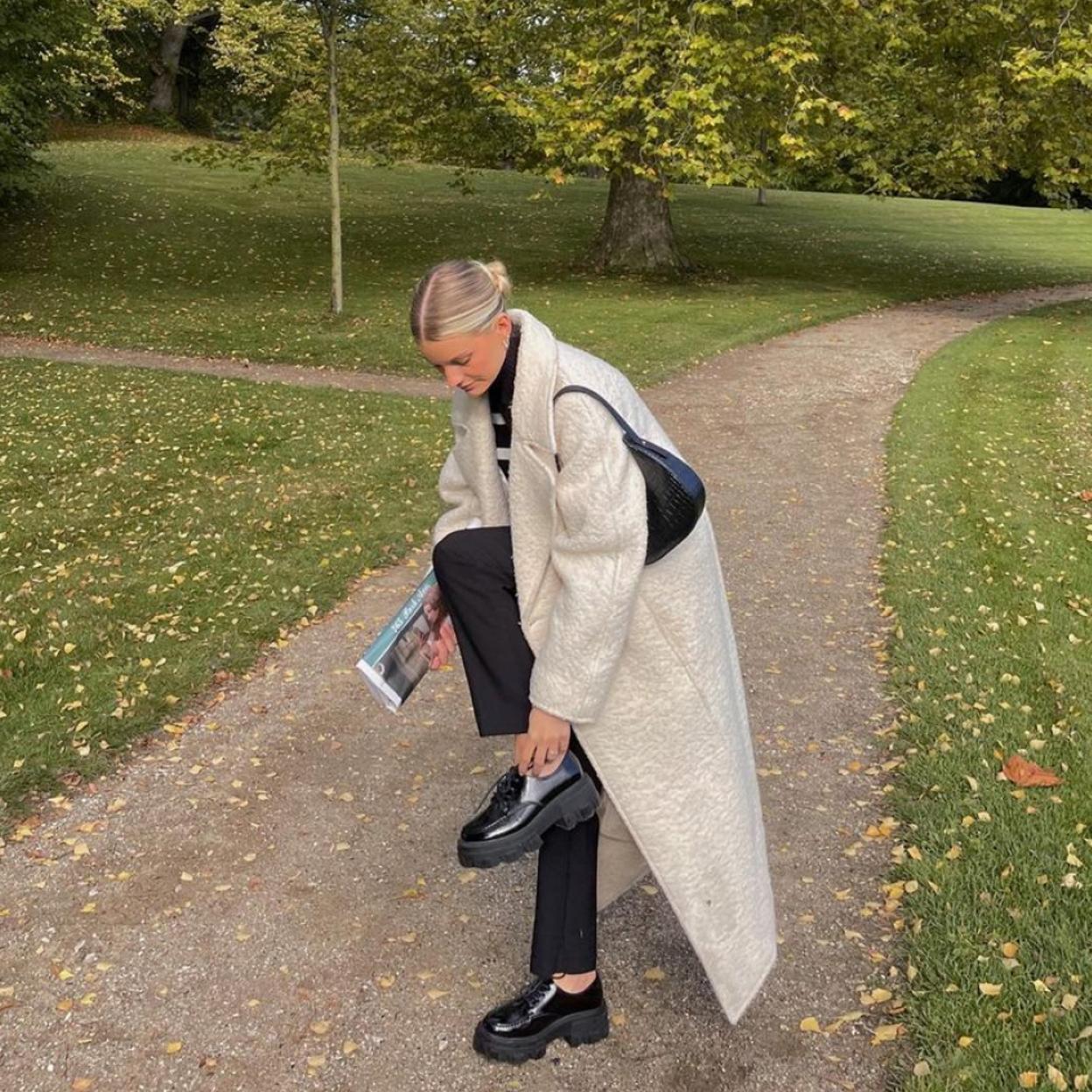 Los abrigos más elegantes de esta temporada son de color blanco.