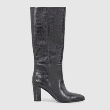 Imagen secundaria 1 - El bolso y las botas de Iks y las medias de Calzedonia.