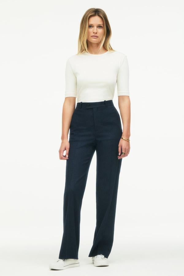 Pantalón de edición limitada de tiro bajo con bolsillos laterales y rayas diplomáticas. Precio: 59,95 euros.