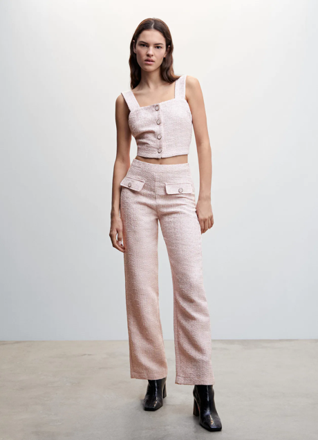 Imagen - Pantalón de tiro alto, 29,99€; top de tirantes, 49,99€.