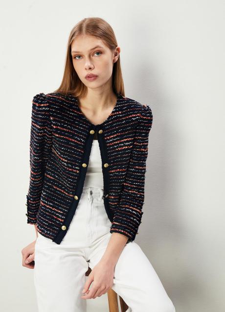 Imagen - Americana corta de tweed de Sfera (29,99 euros)