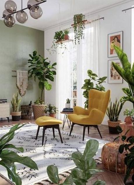 Imagen - Las plantas añaden el toque verde a un salón en el que el elemento central es una butaca amarillo mostaza. 