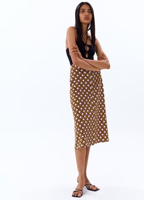 Imagen - Falda estampada con botones de Sfera, 5,99€.