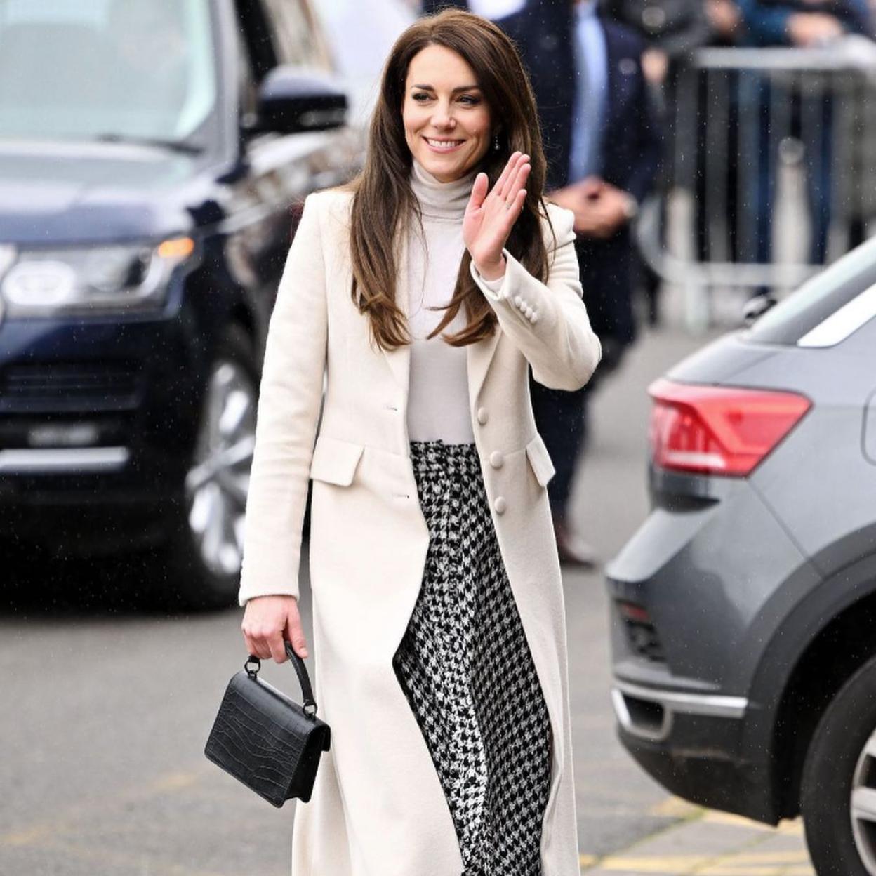 Kate Middleton con jersey de cuello cisne.