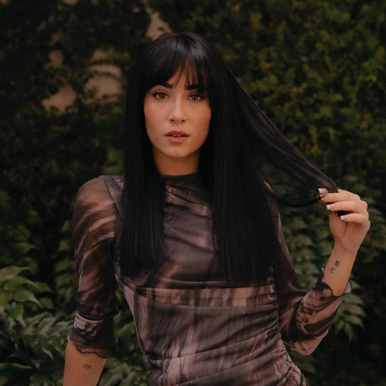 La cantante Aitana con pelo liso