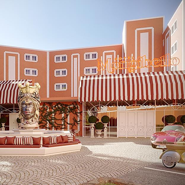 Una vespa, un Alfa Romeo Spider y una fuente con una testa di Moro decoran la entrada del hotel Mongibello, en Ibiza. 