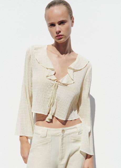 Imagen - Blusa texturizada con lazada frontal