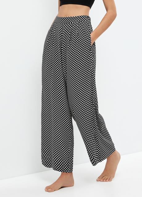 Imagen - Pantalón de lino con estampado de lunares de Oysho (19,99 euros). Foto: Oysho.