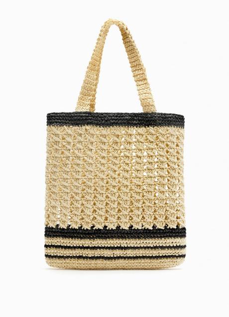Imagen - Bolso trenzado en natural y negro de Zara. Foto: Zara.