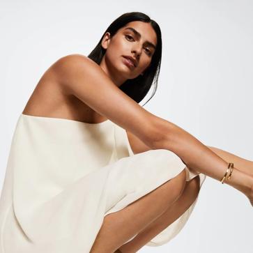 Imagen secundaria 1 - Vestido asimétrico en blanco de Mango Outlet.