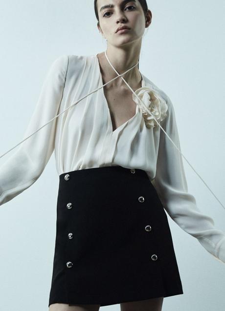 Imagen - Mini falda con botones de Sfera (29,99 euros)