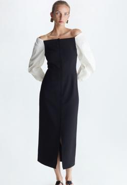 Imagen secundaria 2 - Yolanda Díaz querrá, probablemente, pasar inadvertida durante la jura de la Constitución de Leonor. Purificación García, su firma de cabecera, propone en su tienda online dos vestidos que encajarían con su objetivo y estilo. 