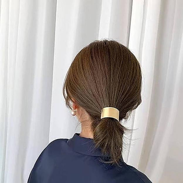 Coletero de pelo metálico dorado