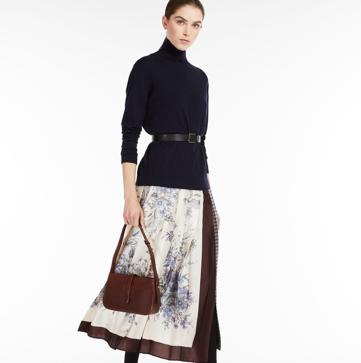 Imagen secundaria 1 - Cinco marcas con las que es imposible equivocarse si quieres vestir bien después de los 50