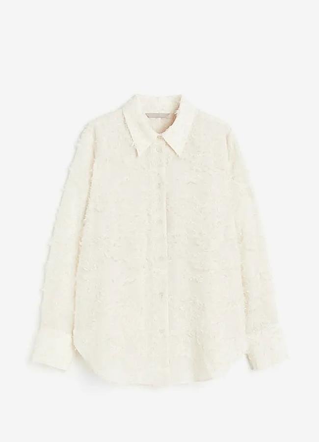 Imagen - Camisa diferente de H&M.