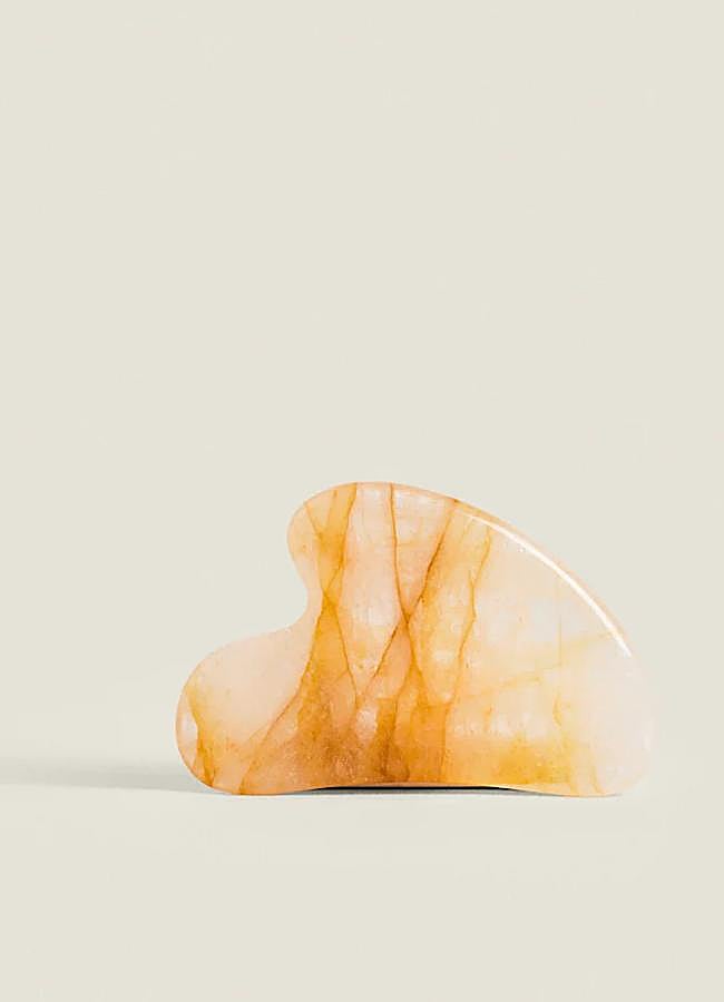 Imagen - Masajeador facial Gua Sha en cuarzo amarillo.