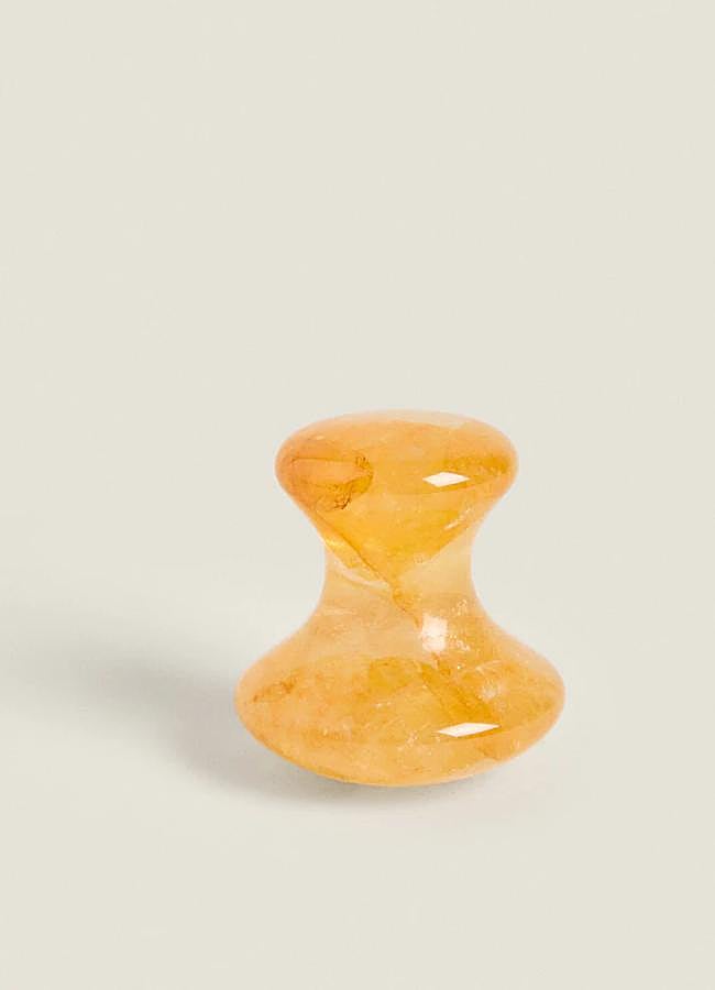 Imagen - Masajeador facial de cuarzo amarillo.