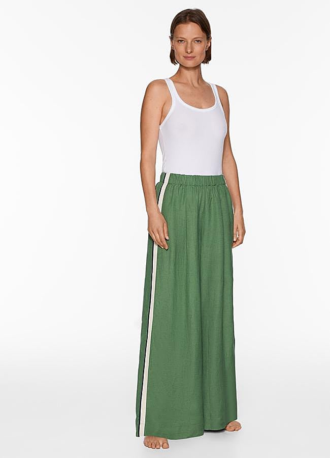 Imagen - Pantalón fluido en color verde con ribetes a contraste de Oysho.