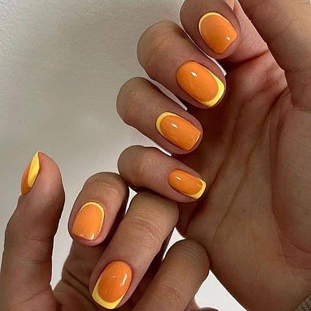 Manicura grancesa invertida con tonos cítricos veraniegos