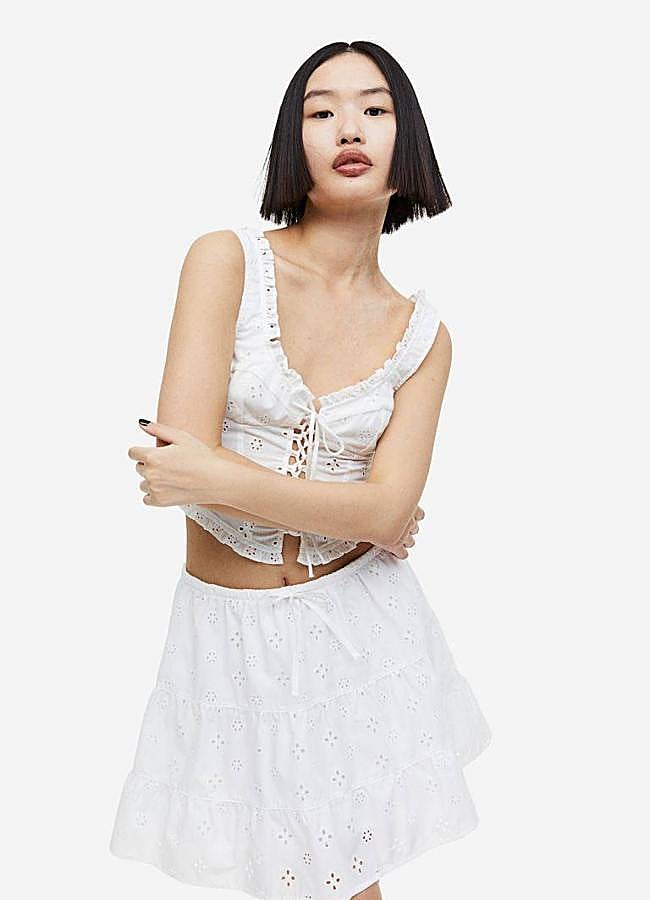 Imagen - Conjunto bordado con top corsetero y falda corta