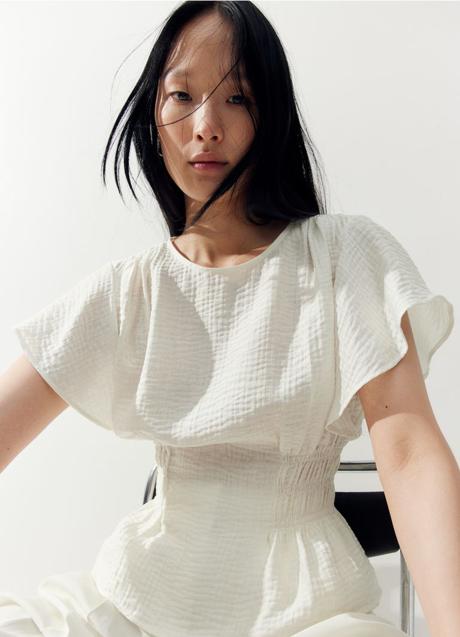 Imagen - Blusa blanca de H&M (15,99 euros)