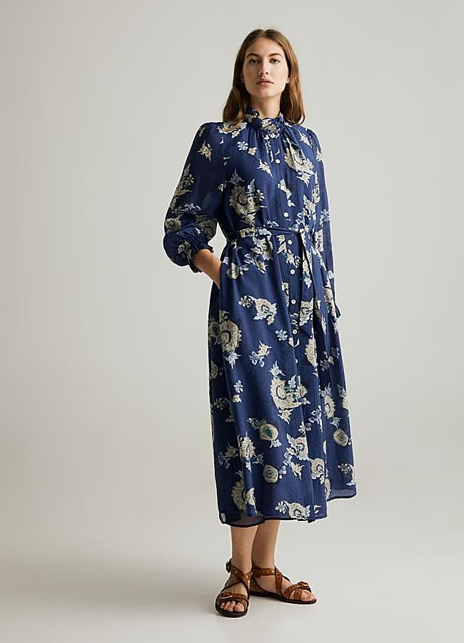 Imagen - Vestido de manga francesa con flor de Lloyd's. 150 euros.