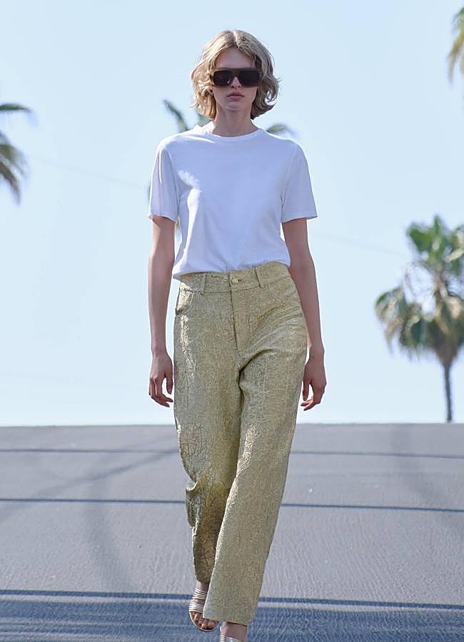 Imagen - Pantalones con brillo dorados de Zara