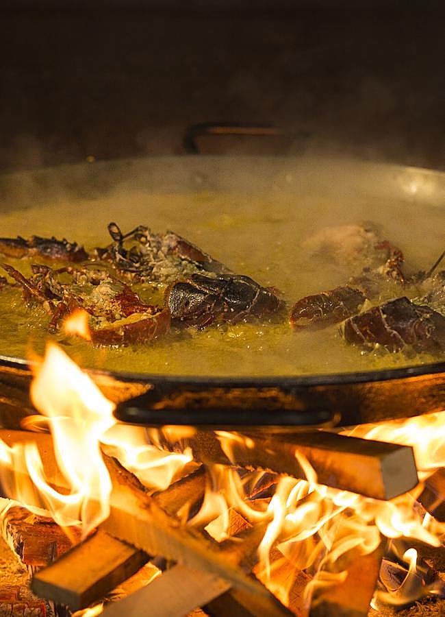 Imagen - Arroz con bogavante al fuego en el restaurante valenciano Casa Carmela. /DR