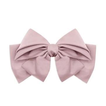 Imagen secundaria 1 - Diadema de Marcela&Co (20 euros), lazo de You are the princess (2,99 euros en Primor) y pasador joya de Bijou Brigitte (14,95 euros).