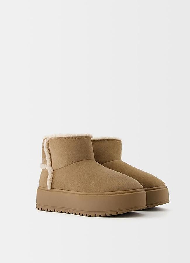 Imagen - Botas con forro de pelo y costuras decorativas