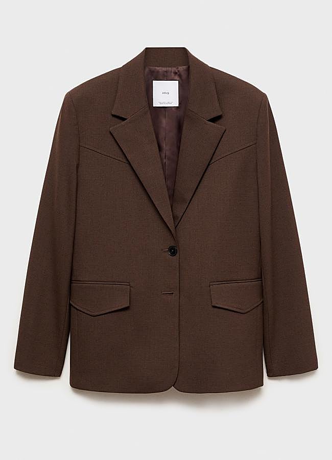 Imagen - La blazer tiene un discreto estampado de pata de gallo. / Mango