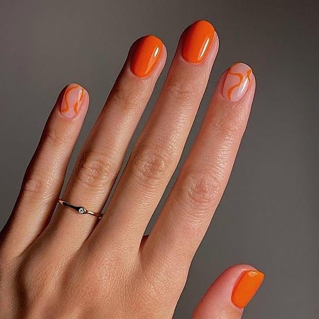 Uñas color naranja tendencia para verano