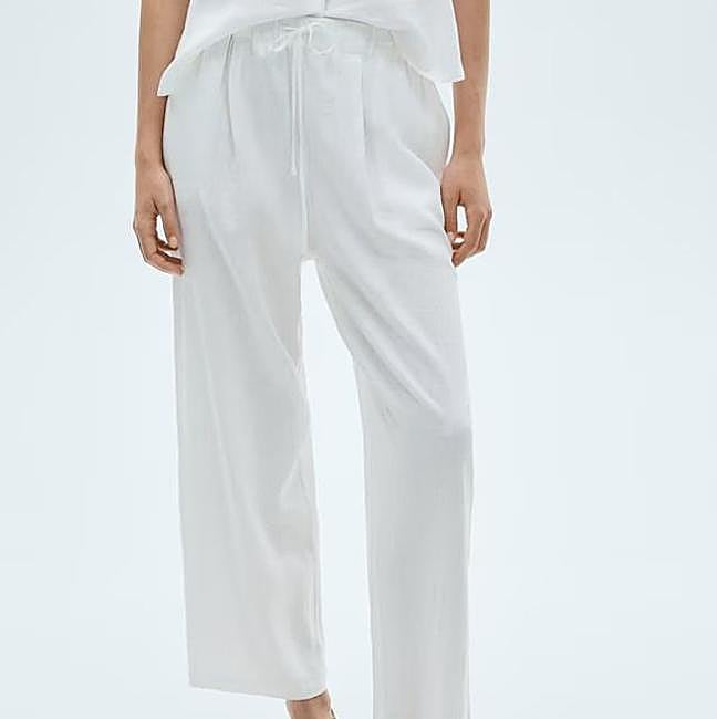 Pantalones fluidos de lino color blanco