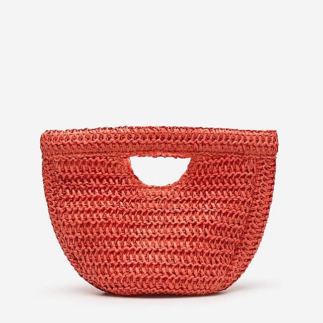 Bolso naranja de Cortefiel, 15,99 euros.