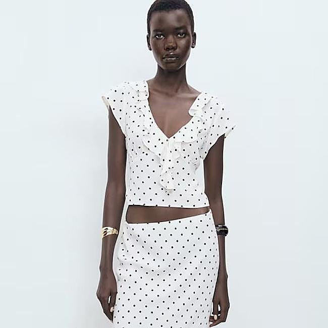 Blusa con estampado de lunares