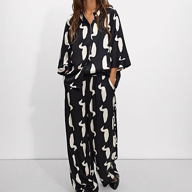 Conjunto largo blanco y negro de Parfois: pantalón 25,99 euros y camisa 29,99 euros.