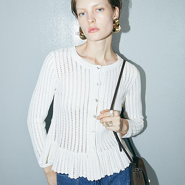 Chaqueta de punto calado con volante