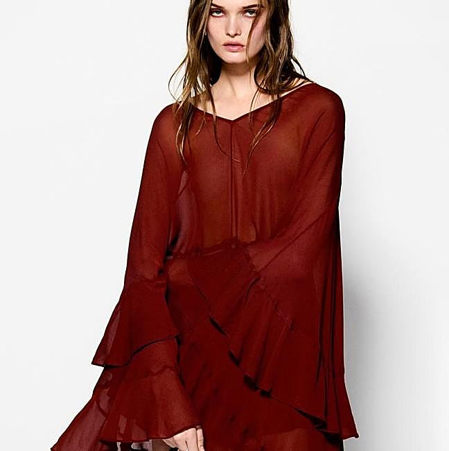 Blusa capa de volantes oversize