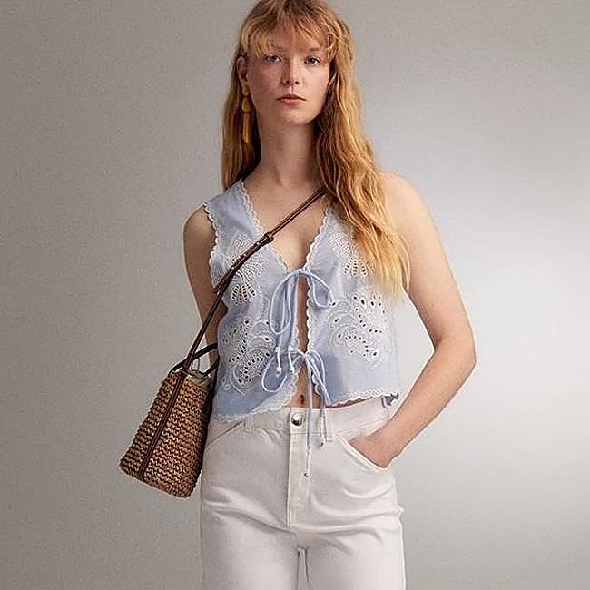 Chaleco bordado con perforados